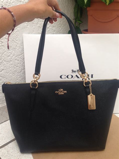 bolsa coach negra